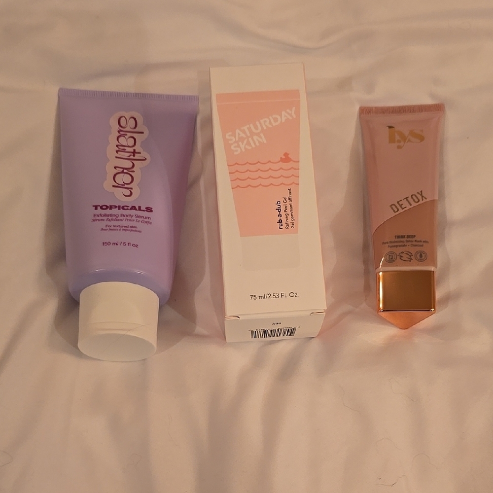 Skincare Trio with Purple, Pink, and Peach Packaging